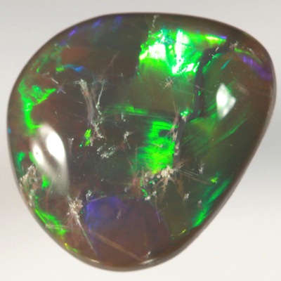 SOLID BLACK OPAL Very bright rolling flashes, neon copper orange and green